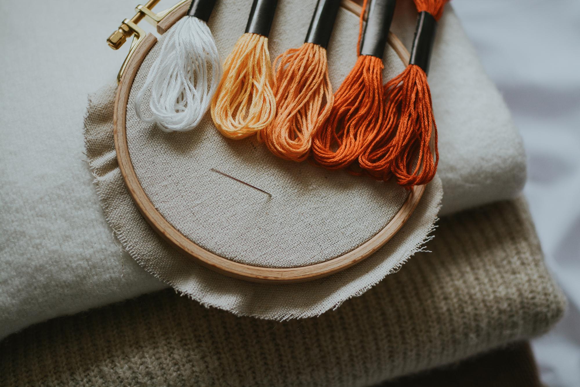 Close-up of hand embroidery on linen